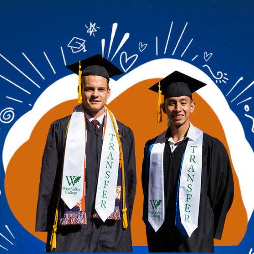Two students smiling in grad garb